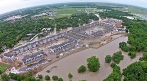 An apartment complex in San Marcos, Tex., one of many fast-growing communities hit hard by flooding. Credit Stephen Ramirez, Birdsiview.org